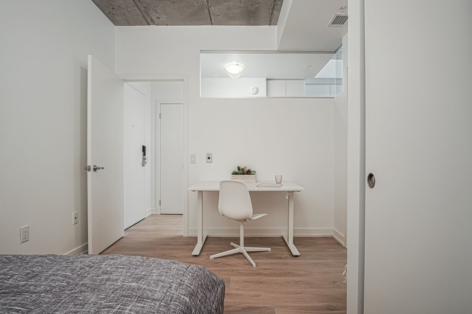 unity point bedroom with desk in kingston student housing